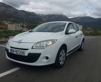 Front view of a rental Renault Megane in Bar, Montenegro ✓ Car #988. ✓ Manual TM ✓ 28 reviews.