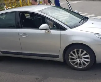 Citroen C4 2010 car hire in Montenegro, featuring ✓ Diesel fuel and 110 horsepower ➤ Starting from 16 EUR per day.