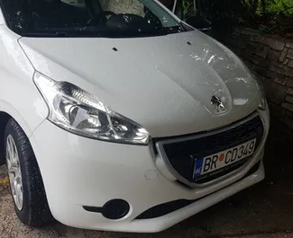 Front view of a rental Peugeot 208 in Bar, Montenegro ✓ Car #532. ✓ Manual TM ✓ 36 reviews.