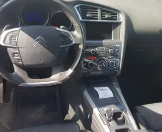 Citroen C4 2014 car hire in Montenegro, featuring ✓ Diesel fuel and 115 horsepower ➤ Starting from 21 EUR per day.