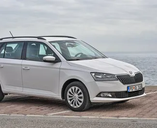 Front view of a rental Skoda Fabia Combi in Budva, Montenegro ✓ Car #2010. ✓ Automatic TM ✓ 13 reviews.