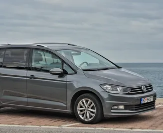 Front view of a rental Volkswagen Touran in Budva, Montenegro ✓ Car #2004. ✓ Automatic TM ✓ 16 reviews.
