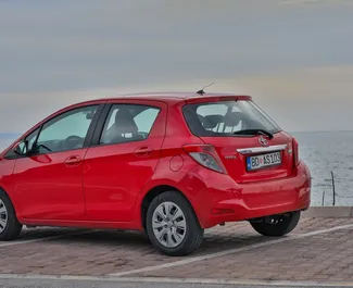 Toyota Yaris 2013 car hire in Montenegro, featuring ✓ Petrol fuel and 80 horsepower ➤ Starting from 21 EUR per day.