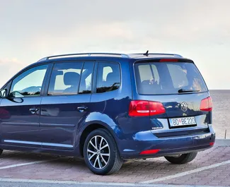 Volkswagen Touran 2014 car hire in Montenegro, featuring ✓ Diesel fuel and 100 horsepower ➤ Starting from 32 EUR per day.