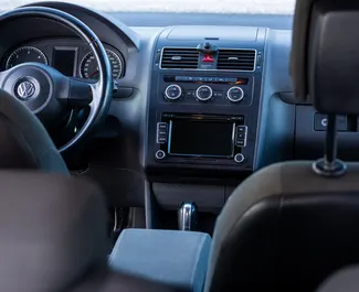 Volkswagen Touran rental. Comfort, Minivan Car for Renting in Montenegro ✓ Without Deposit ✓ TPL, CDW, SCDW, Theft, Abroad insurance options.