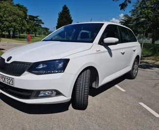 Front view of a rental Skoda Fabia Combi in Bar, Montenegro ✓ Car #2044. ✓ Automatic TM ✓ 40 reviews.