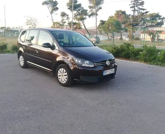 Front view of a rental Volkswagen Touran in Bar, Montenegro ✓ Car #2045. ✓ Automatic TM ✓ 27 reviews.