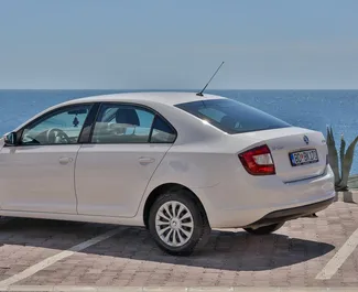 Skoda Rapid 2019 car hire in Montenegro, featuring ✓ Petrol fuel and 81 horsepower ➤ Starting from 27 EUR per day.
