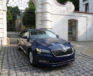 Front view of a rental Skoda Superb Combi in Prague, Czechia ✓ Car #22. ✓ Automatic TM ✓ 1 reviews.