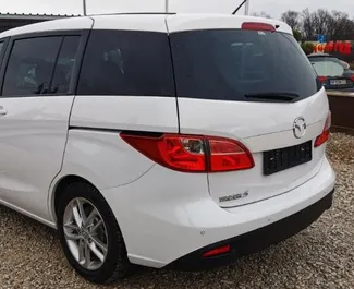 Mazda 5 2016 car hire in Bulgaria, featuring ✓ Petrol fuel and 150 horsepower ➤ Starting from 55 EUR per day.