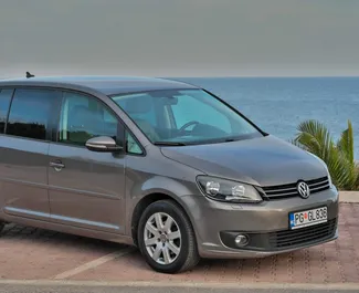Front view of a rental Volkswagen Touran in Budva, Montenegro ✓ Car #4210. ✓ Automatic TM ✓ 7 reviews.
