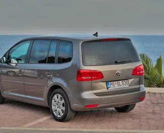 Volkswagen Touran 2014 car hire in Montenegro, featuring ✓ Diesel fuel and 140 horsepower ➤ Starting from 33 EUR per day.