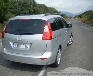 Front view of a rental Mazda 5 in Bar, Montenegro ✓ Car #4231. ✓ Manual TM ✓ 11 reviews.