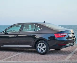 Skoda Superb 2019 car hire in Montenegro, featuring ✓ Diesel fuel and 150 horsepower ➤ Starting from 48 EUR per day.