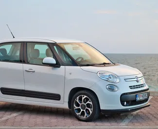 Front view of a rental Fiat 500l in Budva, Montenegro ✓ Car #5908. ✓ Manual TM ✓ 1 reviews.