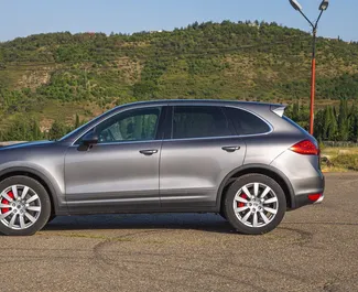 Noleggio auto Porsche Cayenne Turbo 2011 in Georgia, con carburante Benzina e 500 cavalli di potenza ➤ A partire da 320 GEL al giorno.
