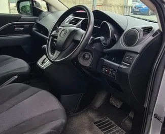 Noleggio auto Mazda Premacy 2015 a Cipro, con carburante Benzina e 120 cavalli di potenza ➤ A partire da 98 EUR al giorno.