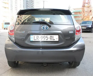 Noleggio auto Toyota Prius C 2012 in Georgia, con carburante Ibrido e 99 cavalli di potenza ➤ A partire da 71 GEL al giorno.