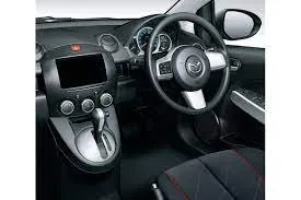 Vooraanzicht van een huurauto Mazda Demio in Larnaca, Cyprus ✓ Auto #9512. ✓ Transmissie Automatisch TM ✓ 2 beoordelingen.