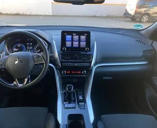 Hybrid 2.4L engine of Mitsubishi Eclipse Cross 2022 for rental in Prague.