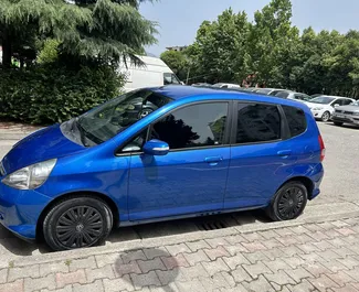 Front view of a rental Honda Jazz at Tirana airport, Albania ✓ Car #10091. ✓ Automatic TM ✓ 2 reviews.