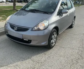 Front view of a rental Honda Jazz at Tirana airport, Albania ✓ Car #10093. ✓ Automatic TM ✓ 0 reviews.