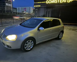 Front view of a rental Volkswagen Golf 5 at Tirana airport, Albania ✓ Car #10083. ✓ Manual TM ✓ 1 reviews.