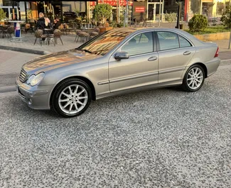 Front view of a rental Mercedes-Benz C-Class at Tirana airport, Albania ✓ Car #10082. ✓ Automatic TM ✓ 0 reviews.