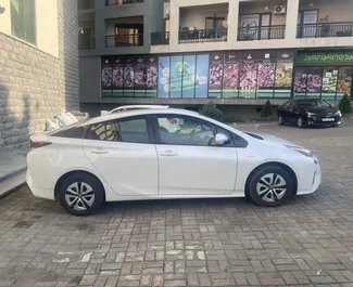 Noleggio auto Toyota Prius 2016 in Georgia, con carburante Ibrido e 120 cavalli di potenza ➤ A partire da 104 GEL al giorno.