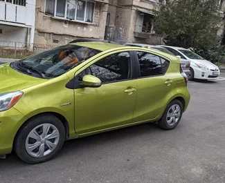 Noleggio auto Toyota Prius C 2015 in Georgia, con carburante Benzina e 120 cavalli di potenza ➤ A partire da 76 GEL al giorno.