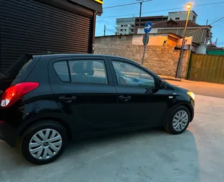 Petrol 1.3L engine of Hyundai i20 2015 for rental at Tirana airport.
