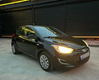 Front view of a rental Hyundai i20 at Tirana airport, Albania ✓ Car #10900. ✓ Manual TM ✓ 2 reviews.