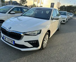Front view of a rental Skoda Scala at Tirana airport, Albania ✓ Car #11523. ✓ Manual TM ✓ 0 reviews.