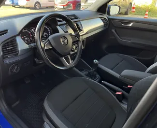 Interior of Skoda Fabia Combi for hire in Czechia. A Great 5-seater car with a Manual transmission.