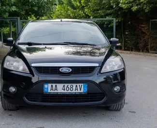 Predný pohľad na prenajaté auto Ford Focus v v meste Durres, Albánsko ✓ Auto č. 10769. ✓ Prevodovka Manuálne TM ✓ Hodnotenia 2.