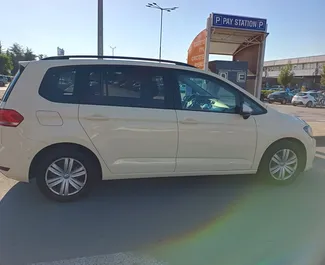 Front view of a rental Volkswagen Touran in Burgas, Bulgaria ✓ Car #14572. ✓ Automatic TM ✓ 0 reviews.