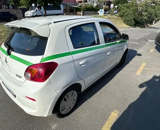 Mitsubishi Space Star rental. Economy Car for Renting in Bulgaria ✓ Deposit of 100 EUR ✓ TPL, CDW, SCDW, FDW, Theft, Abroad, Young, No Deposit insurance options.