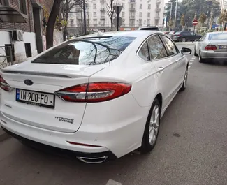 Pronájem Ford Fusion Sedan. Auto typu Komfort k pronájmu v Gruzii ✓ Vklad 900 GEL ✓ Možnosti pojištění: TPL, CDW, FDW, Cestující, Krádež.