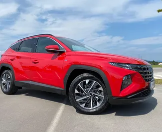 Vooraanzicht van een huurauto Hyundai Tucson in Ljubljana, Slovenië ✓ Auto #15660. ✓ Transmissie Automatisch TM ✓ 0 beoordelingen.